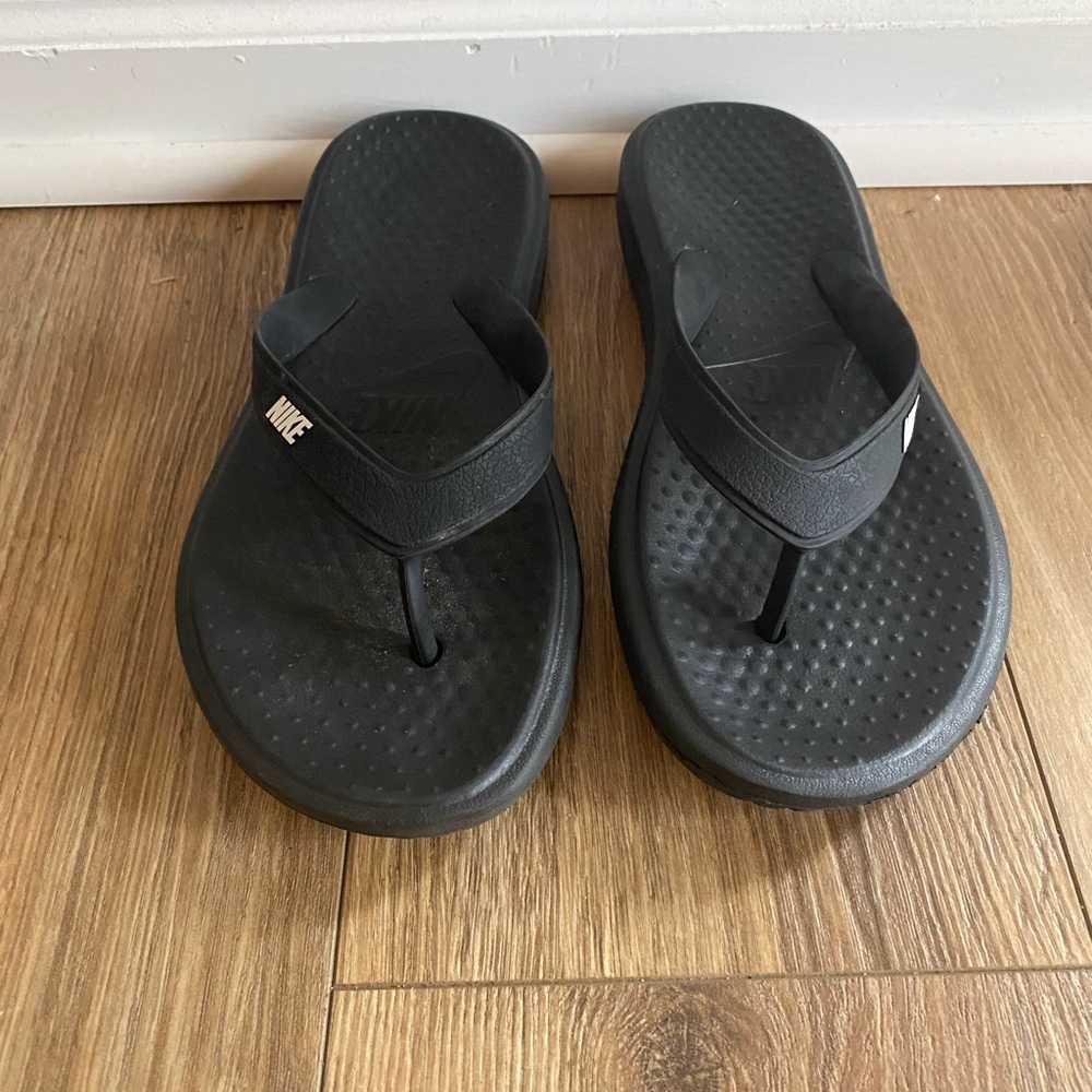 Black Nike sandals, size US 13, in perfect used condition